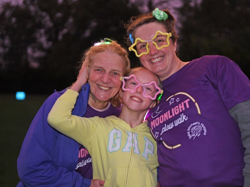 Sue Koopmans, Morgana Koopmans and Tessa Koopmans getting their glow on with colourful accessories to support Saint Michael’s Hospice
