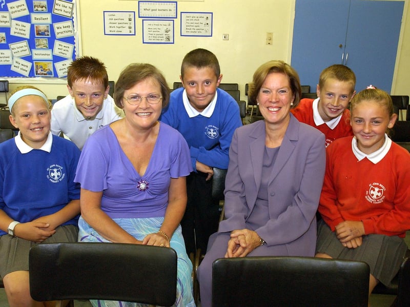 Murial Blake and Madeleine Stones were retiring in 2006 and some of the Year 6 leavers joined them for this photo.