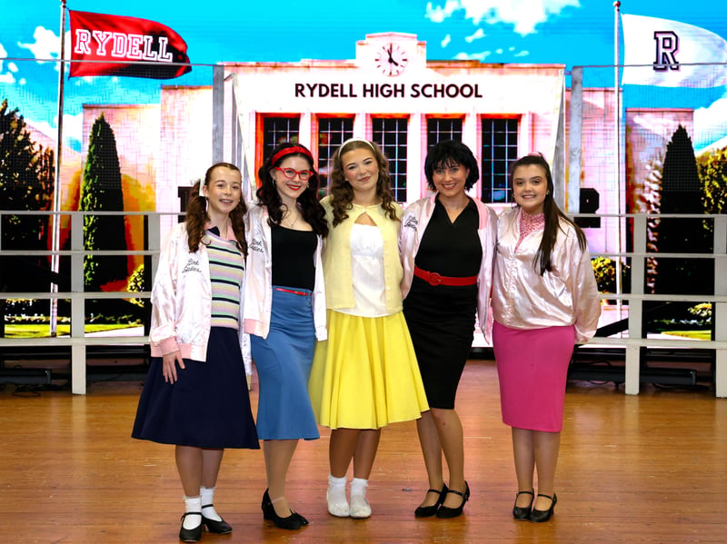 SANDY pictured with the pink ladies: OOrla Byrne, Juliette Havern-Malone, Lily Sloan, Robyn Cunningham and Ellie Lavery. NM264244
