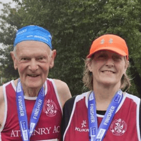Peadar Nugent with clubmate and training partner Máire Treasa Beatty after completing yet another Dublin City Marathon.