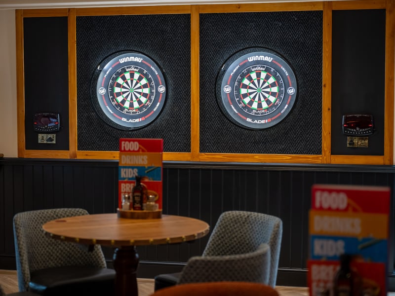 There is a dedicated sports area for darts and pool.