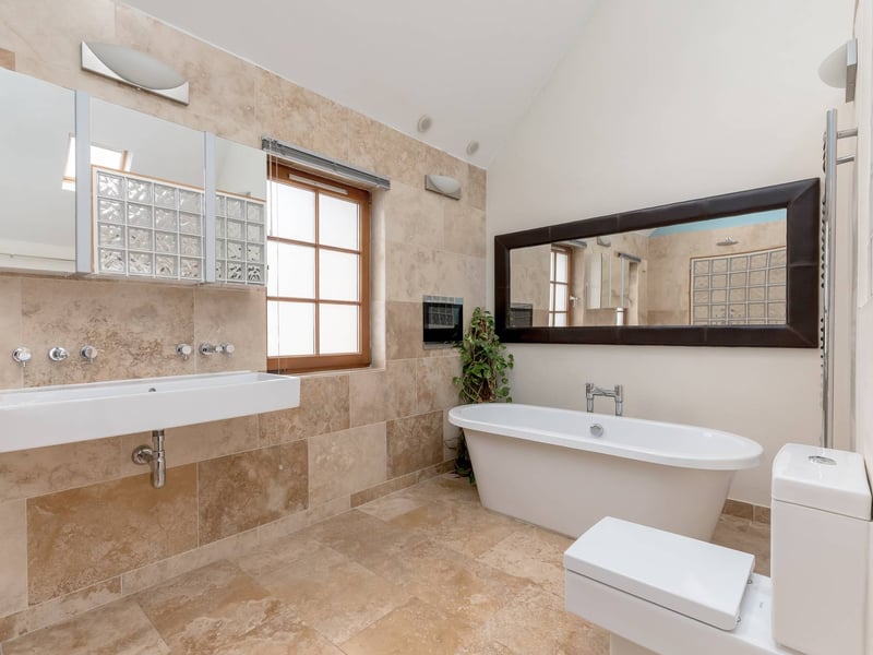 The luxury bathroom. There is ample off-street parking in addition to the triple garage, while the property's position within Archerfield places it within easy reach of Yellowcraig Beach and some of Scotland's finest golf courses, combining a highly private setting with exceptional access to the East Lothian coastline.