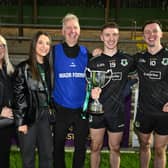 Rock joint manager Adrian Nugent celebrates with his sons  Odhran and Liam Nugent and the family after in the Tyrone Intermediate Championship Final replay Rock v Pomeroy, at Dungannon , Co. Tyrone. 