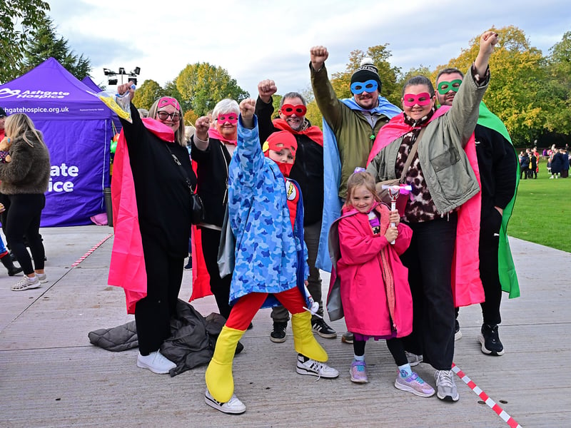 Caped superheroes support the walk for Ashgate Hospice.