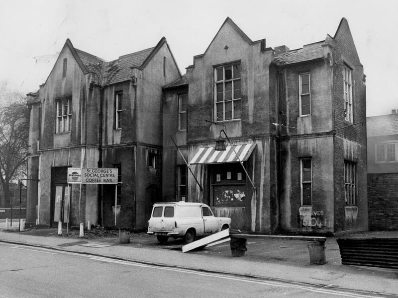Demolition work begins on the 130-year-old former St George's school building in St George's Parade, Wolverhampton, on April 17, 1970. Known as The Fold, the historic site served many purposes after closing as a school around 1940, including housing Polish refugees, running a nightclub a decade prior, and functioning as both a youth club and a shelter for homeless men. Declared unsafe a year before workmen began tearing down the roof, the building held fond memories for locals. Do you remember attending youth activities or passing by The Fold in St George's Parade before its demolition in 1970? What are your memories of St George's Social Centre and coffee bar back then?