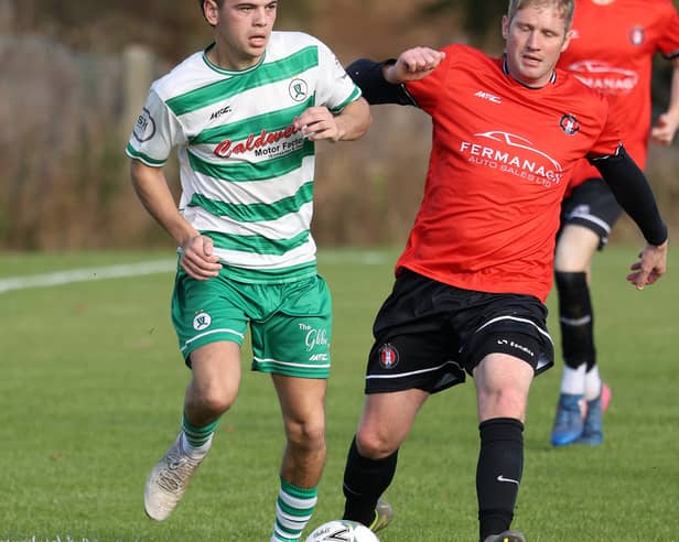 Full back Nathan Sloan in possession for Strathroy.GMF42002
