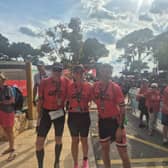 Seamus Arkinson, Meabh, and Ruairi McConnell, pictured at the Challenge Peguera-Mallorca finish line.