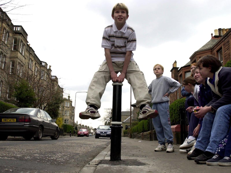 These bollards on East Trinity Road were installed in March, 2000, to replace bollards which had recently been installed in the street to stop vehicles mounting the curb.