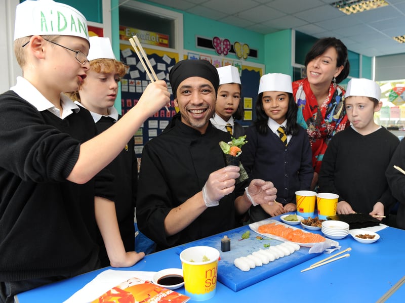 P5 pupils from Trinity Primary School were shown how to prepare shell fish and other types of sea food, during Sushi classes in October, 2012.