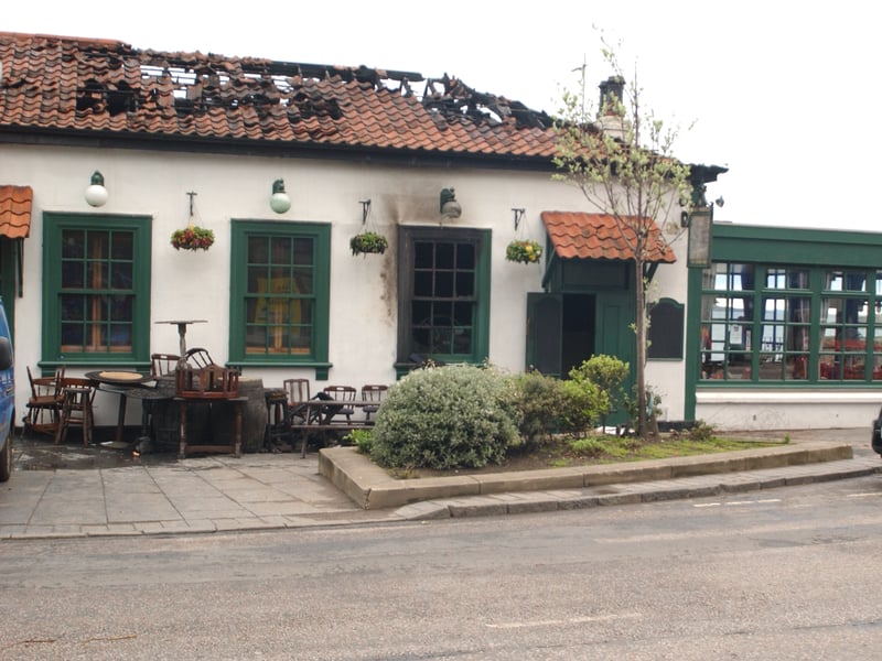The Old Chain Pier pub on Trinity Crescent, pictured after it was badly damaged in a fire in April, 2004.