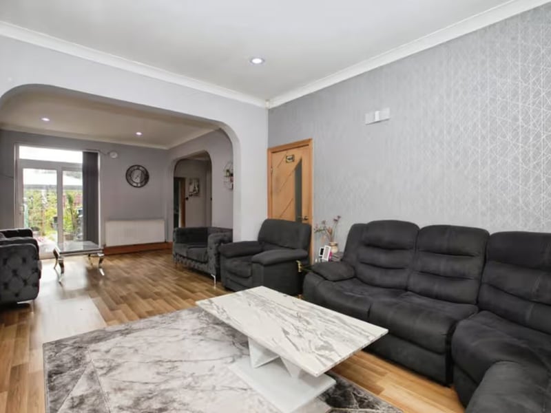 Living room one with a sitting room at the back
