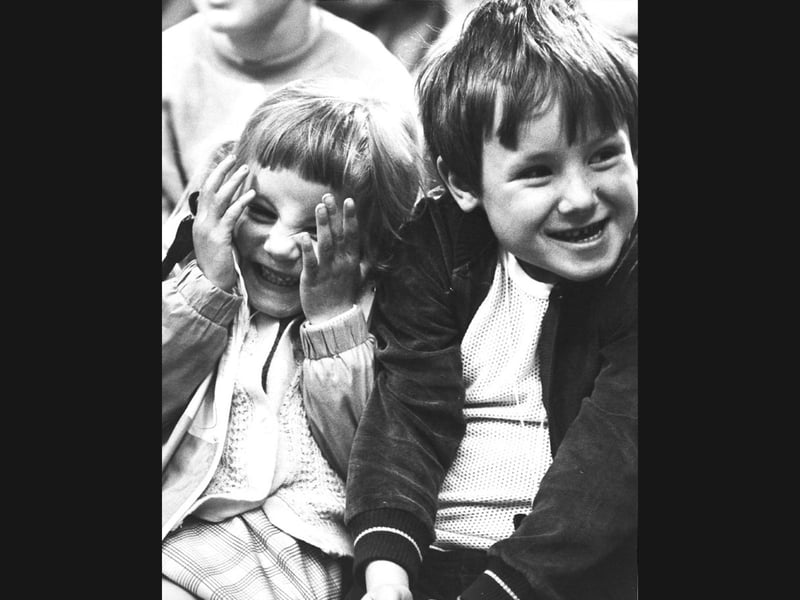 Pure giggles and wide smiles take over as four-year-old Rachel Ward covers her eyes while her six-year-old brother Stewart grins beside her during a lively Punch and Judy show on May 29, 1985. The young duo from Bushbury were swept up in the absolute excitement at the Mander Centre as the venue kicked off its festive Millennium Shop 'n' Fun fortnight. Packed with daily entertainment ranging from Morris dancers to youth brass bands, the action-packed event brought non-stop laughter and pure childhood delight straight to the heart of town!