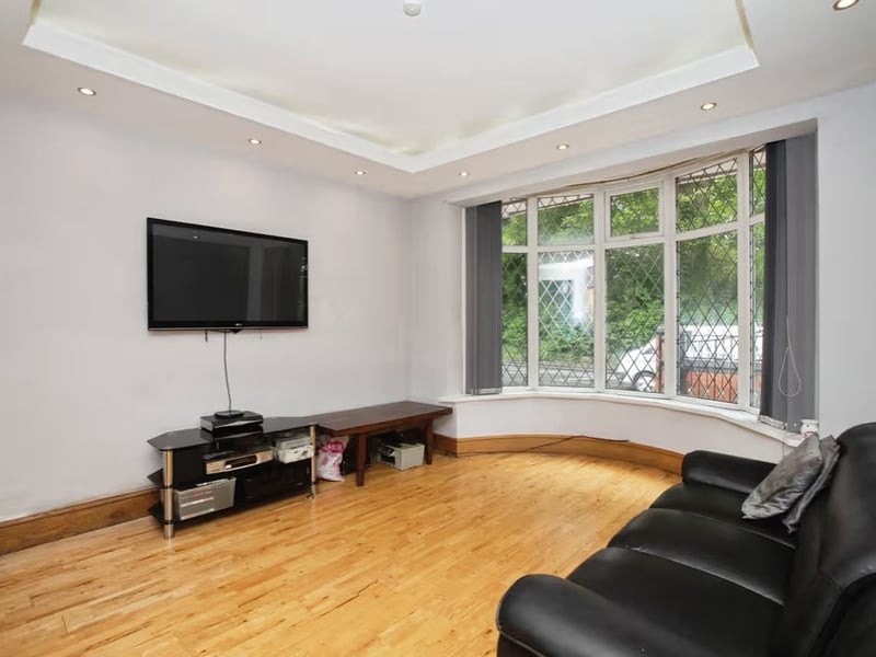 Living room two, which has a dining room to its rear