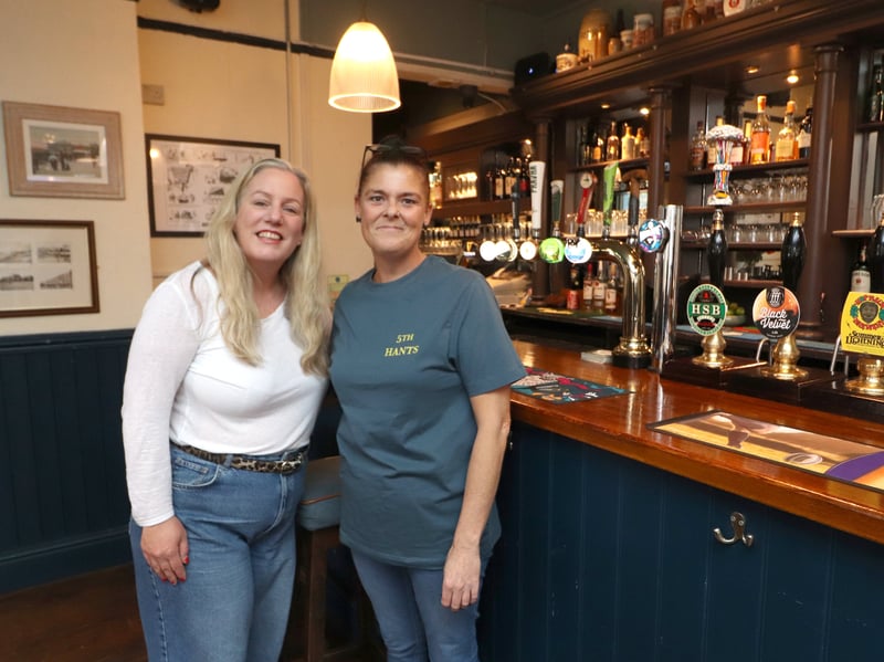  Ally Wern, with bar staff, Louise Goldring.
