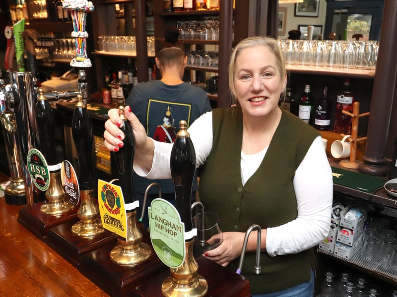 Landlady Ally Wearn pouring a pint on Tuesday, October20.

