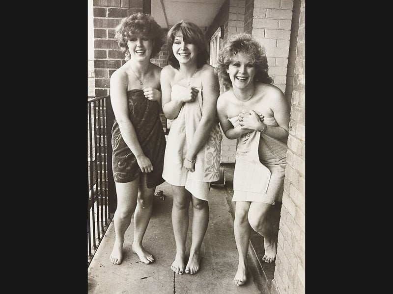 A cheekily unforgettable pre-wedding party! Bride-to-be Karen Laight, aged 23, along with her friend Mandy Sayce and sister Lorraine Laight, shared a huge laugh after a wild hen night prank in February 1983 left them braving the cold Walsall streets with little more than smiles and towels. Stripped by fellow revellers during their big night out, the giggling trio turned heads and brought late-night traffic to a total standstill as they made their legendary trek home. Despite the chilly journey, the high-spirited adventure was taken in complete good humour, and Karen's wedding to fiancé Carl went off without a hitch!
