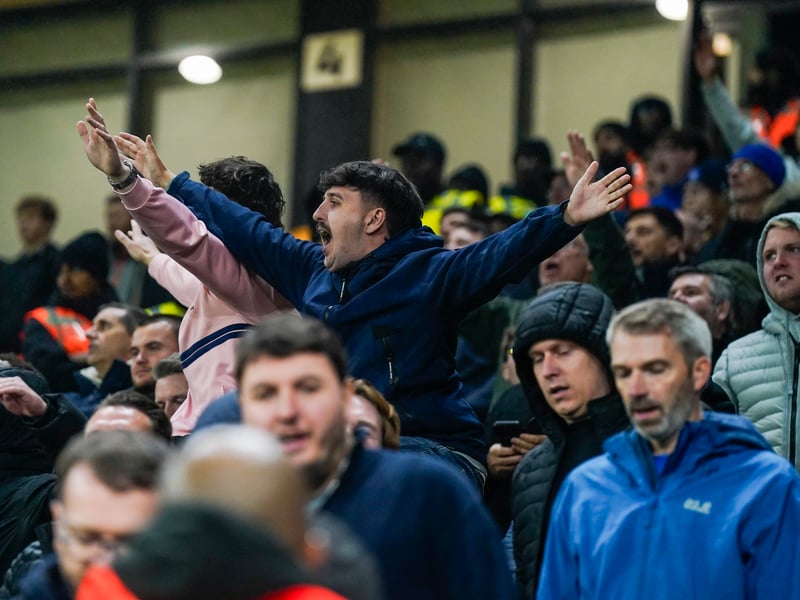 Celebrating a share of the points at the full-time whistle.