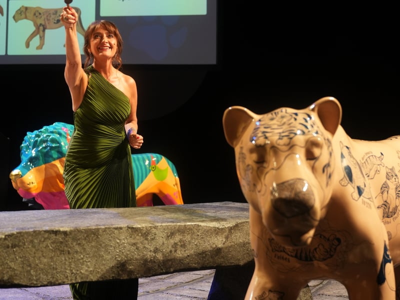 Auctioneer Lucy Crapper takes bids at the Pride of Yorkshire lion auction at the Crucible.