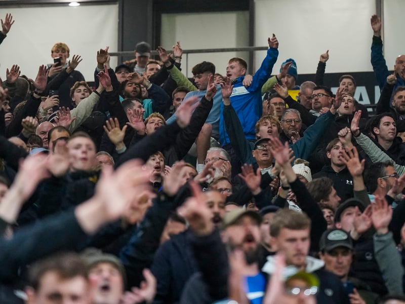Celebrating a share of the points at the full-time whistle.