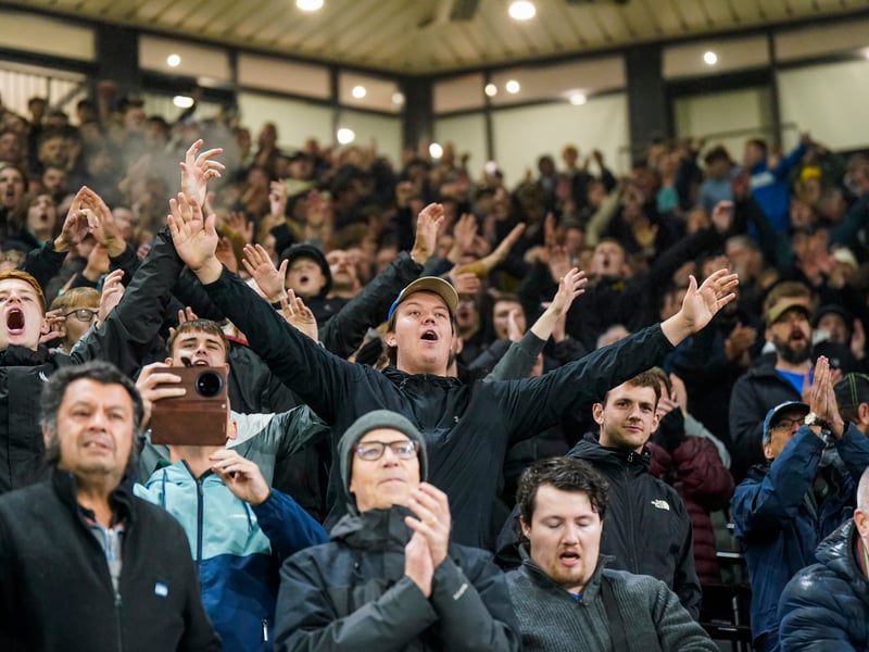 Celebrating a share of the points at the full-time whistle.