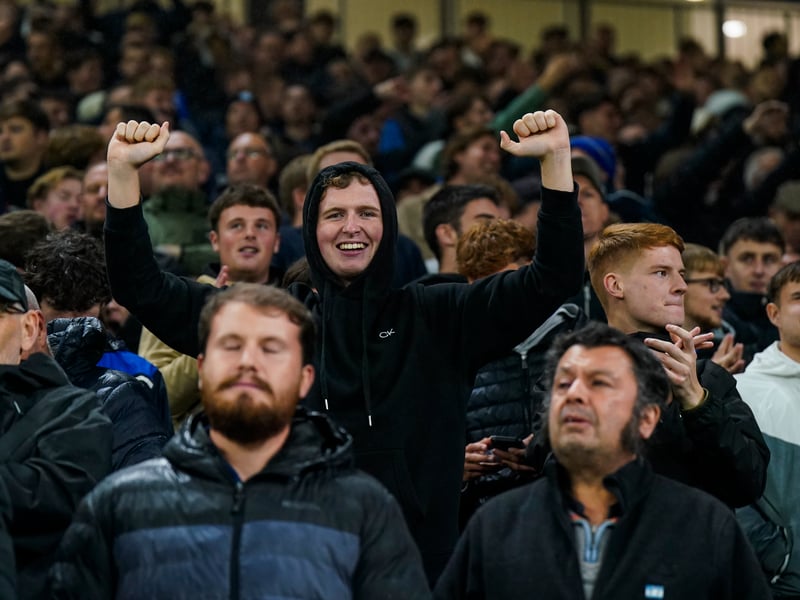 Celebrating a share of the points at the full-time whistle.