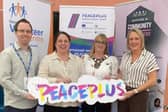 Peaceplus management team alongside Fermanagh and Omagh District Council chairwoman, Cllr Debbie Coyle. SU0842CD26