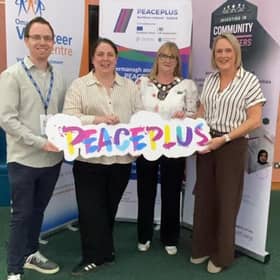 Peaceplus management team alongside Fermanagh and Omagh District Council chairwoman, Cllr Debbie Coyle. SU0842CD26