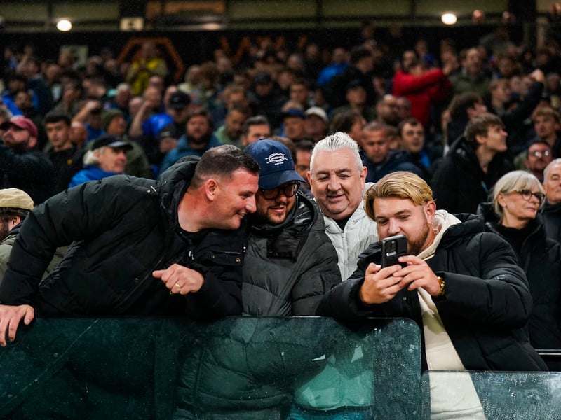 Caught on camera! Checking out Terry Devlin's equaliser against Wolves on the phone.