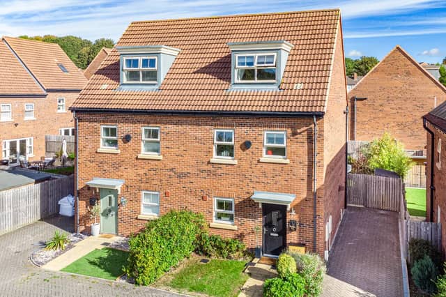 The property offers modern, well-proportioned accommodation arranged over three floors with stylish interiors.