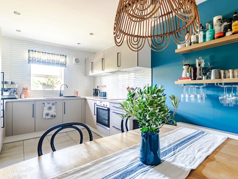 The kitchen is beautifully decorated and fitted with a range of units, attractive tiling and integrated appliances, including a fridge/freezer, dishwasher and washing machine.