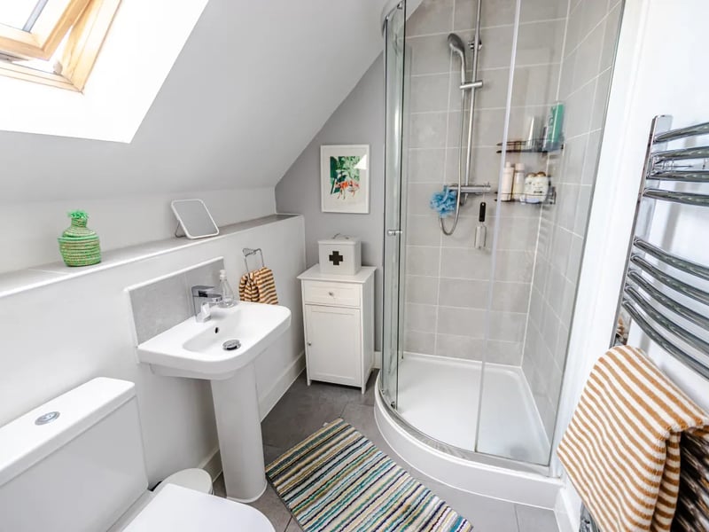 The ensuite shower room is fitted with a shower cubicle, w/c, wash hand basin and heated towel rail.