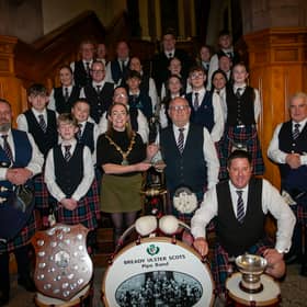 The Mayor of Derry City and Strabane District Council, Grace Ui Niallais, pictured at the Guildhall making a presentation to the Bready Ulster Scots Pipe Band on being crowned world champions 2026 in Grade 4B at the World Pipe Band Championships, and for securing the title of World Champion Drum Corps, Grade 4B.