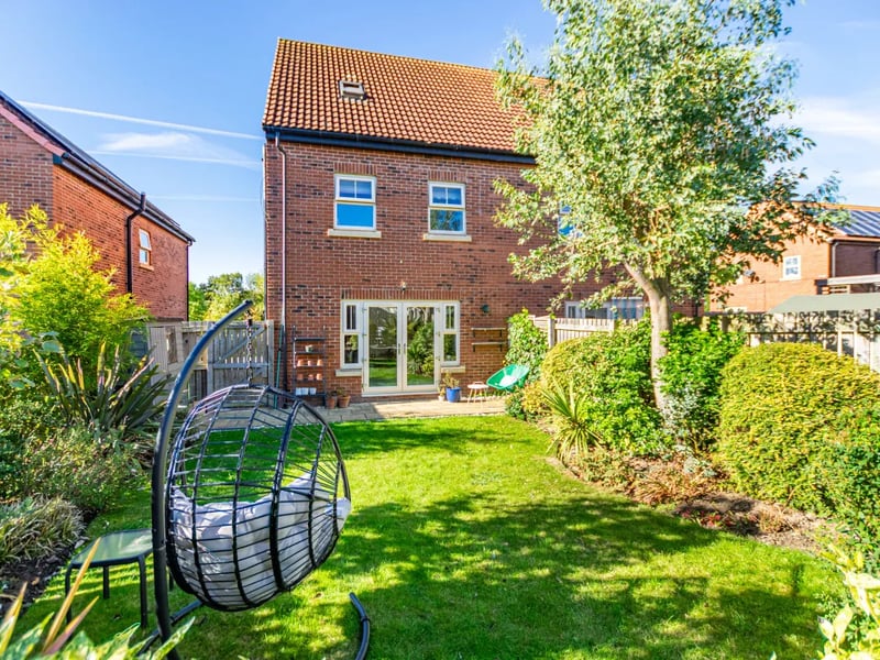 At the rear of the property is an enclosed garden with uninterrupted views across the serene nature reserve opposite.