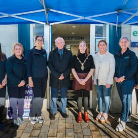 Mayor of Derry City and Strabane District Council, Grace Uí Niallais, pictured with Easilink staff at their new premises in Strabane.