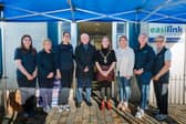 Mayor of Derry City and Strabane District Council, Grace Uí Niallais, pictured with Easilink staff at their new premises in Strabane.