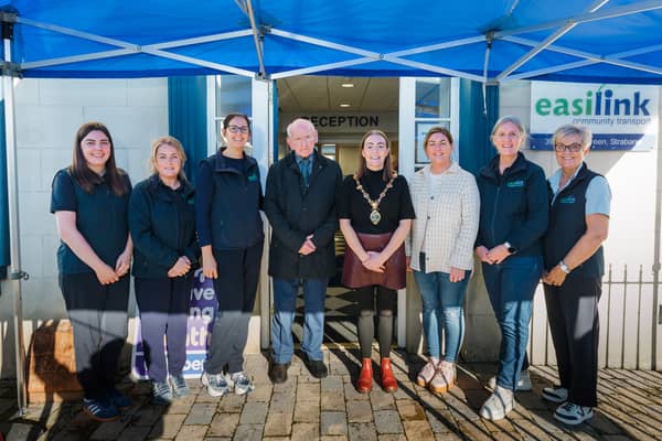 Mayor of Derry City and Strabane District Council, Grace Uí Niallais, pictured with Easilink staff at their new premises in Strabane.