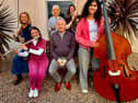 Musicians from South Ulster Sinfonia who will play at Tannaghmore PS on November 14, 2026 pictures with the orchestra's musical director, Philip Walton (seated) and leader for this concert, violinist