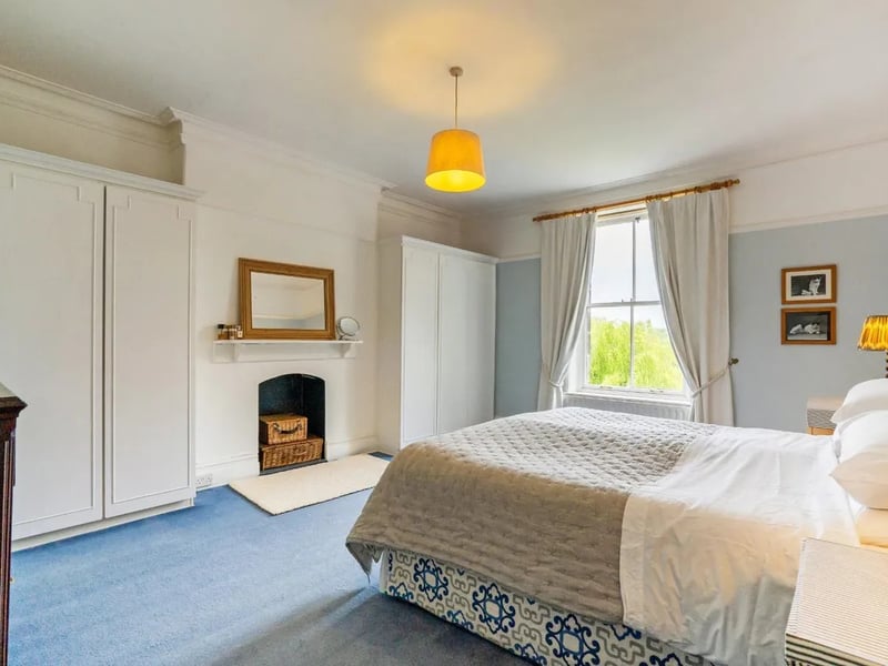 Five impressive bedrooms are arranged over two floors, including the spacious master room.
