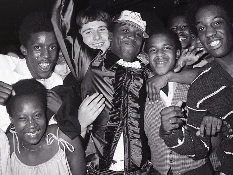 In 1980, dancing master Leroy Allen won the North West's top disco contest... on a split decision. Dancing in the first heat, watched by more than 500 people at Snooty's Disco, Preston, Leroy split his trousers. He gained a place in the last six, then went on to win the contest! Here he is surrounded by supporters
