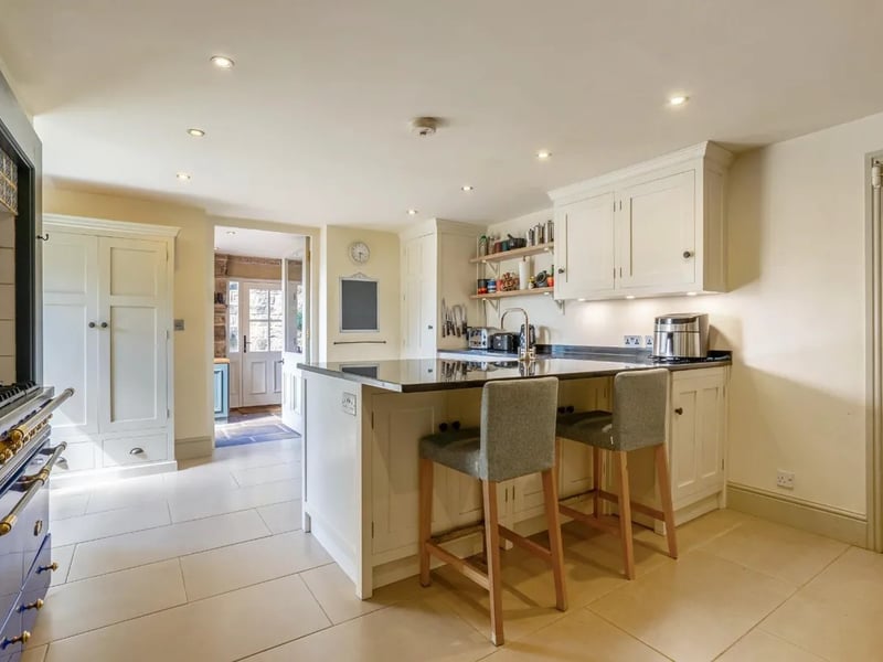 At the heart of the lower ground floor is a stunning kitchen, complemented by a separate characterful dining room.