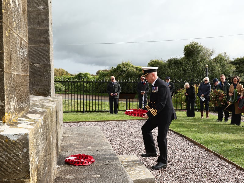 Cdr Steve May of HMS Collingwood lays a wreath at the Nelson monument. Service to commemorate Trafalgar Day and the life of Admiral Lord Nelson.