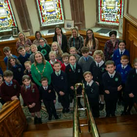 The Mayor of Derry City and Strabane District Council, Grace Ui Niallais, pictured with local primary school children, who took part in Local Democracy Week events at the Guidlhall. Included are some of the teachers and classroom assistants.
