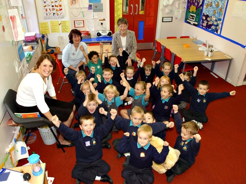 Another photo from 2004 which shows lots of the pupils and staff in celebratory mood after an Ofsted report.