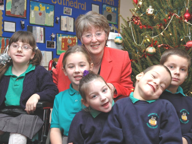 Head teacher Annette Parr retired in 2004 and lots of the children wished her a happy future in this lovely photo.