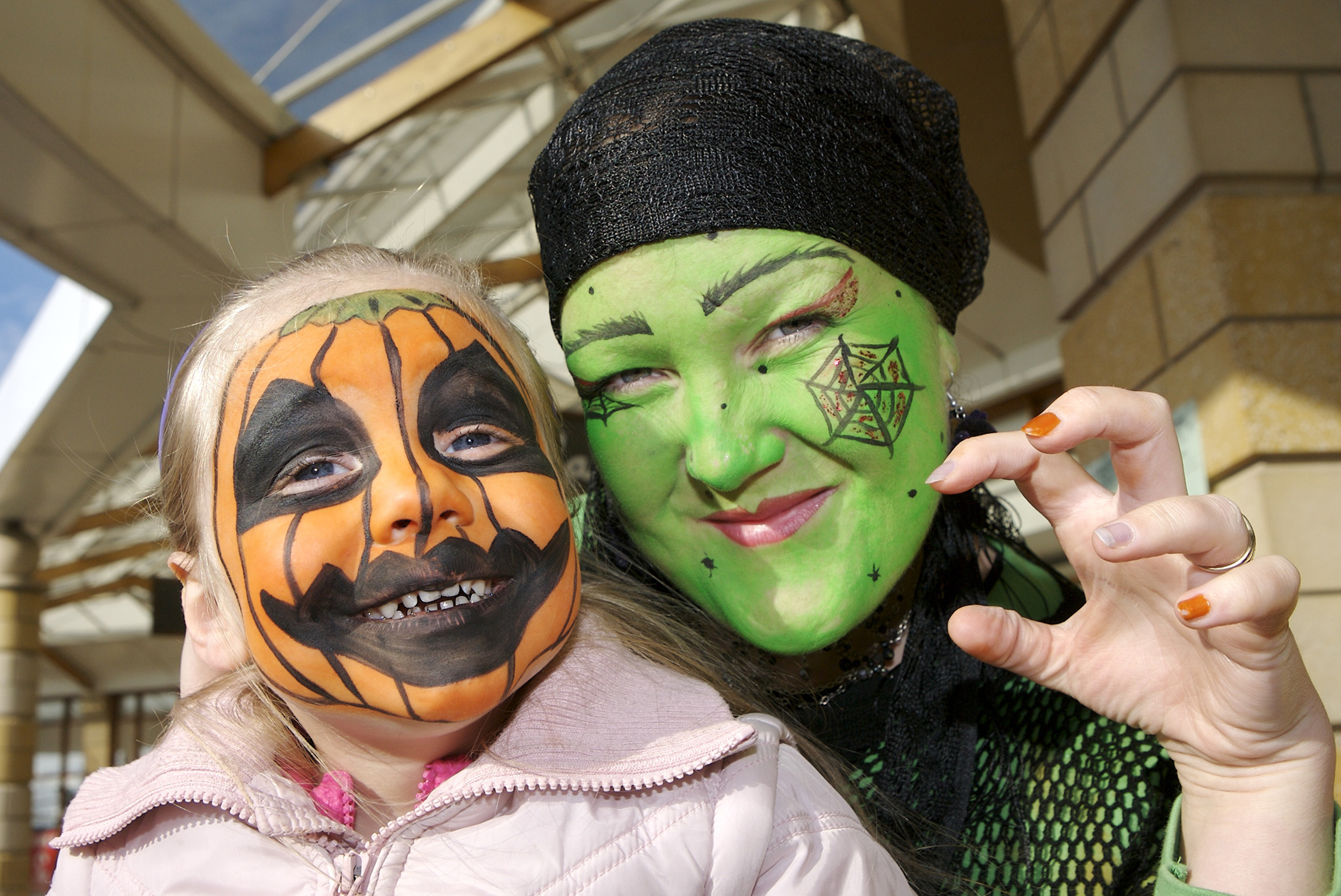 28th October 2007.Halloween event at Doncaster's Lakeside Village. Face painter Jo Daley pictured with Mia Buckley (3).