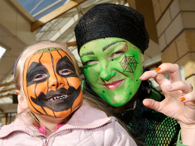 28th October 2007.Halloween event at Doncaster's Lakeside Village. Face painter Jo Daley pictured with Mia Buckley (3).