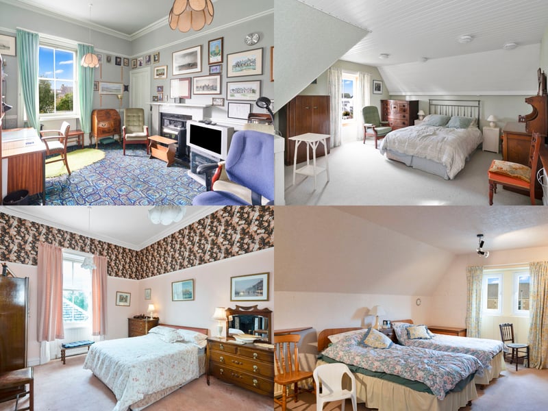 The remaining five bedrooms are generously sized and arranged across the upper two levels. The two first-floor rooms enjoy high ceilings, decorative cornicing, and feature fireplaces, with one also benefiting from built-in storage. Three further double bedrooms occupy the second floor, where sloping ceilings add character. One includes extensive fitted wardrobes and a vanity basin, while another is currently a workshop.