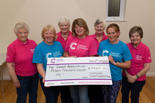 The Coleraine Cancer Research UK Committee, pictured with this years fundraising to January 2026, a total of £15,000 WK42-26-015CR