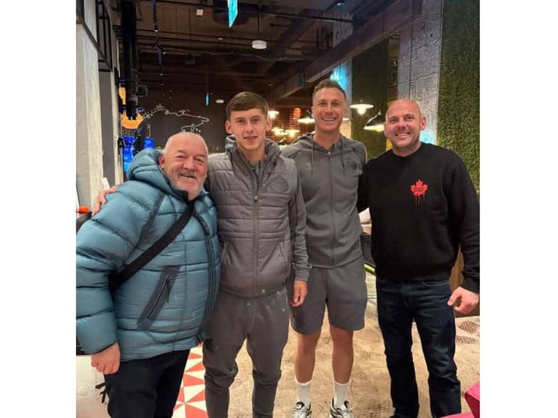 Fans with SAFC players Chris Rigg and Simon Moore
