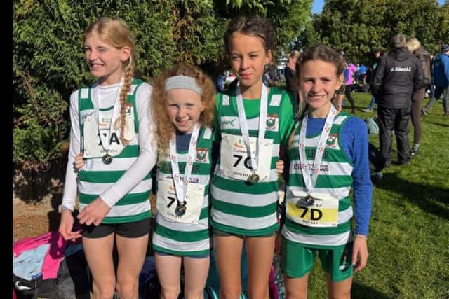 Amelia Farragher, Zara Casserly, Cassie Healy, and Hana Faraj pictured after winning Castlegar AC’s first-ever All-Ireland cross-country relay gold last weekend.